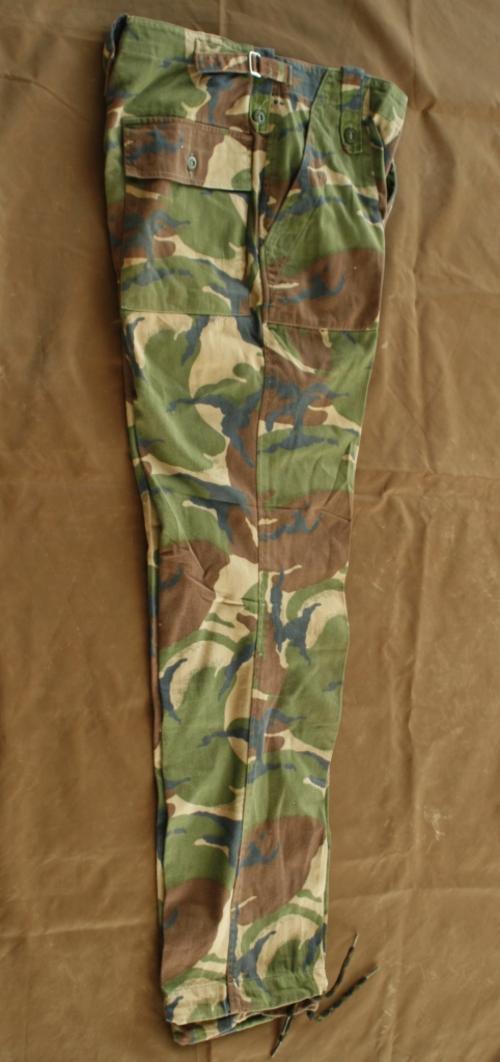 Disruptive Pattern Material. Disruptive Pattern Material Camouflage Pants. Manufactured: Made in China. Material: 100% cotton. Condition: Very good used condition, but missing a button