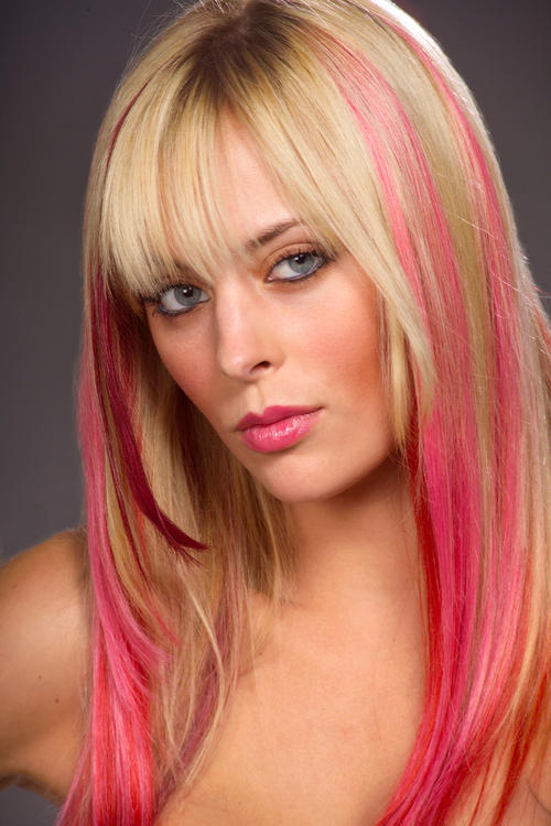 red hair with pink streaks. R45 per streak, you are